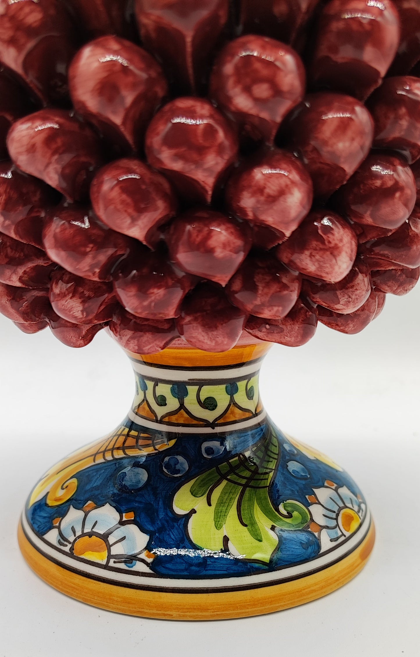 PRICE INCLUDES ONE CERAMIC PINE CONE. PLEASE SELECT MULTICOLOR OR BURGUNDY RED.