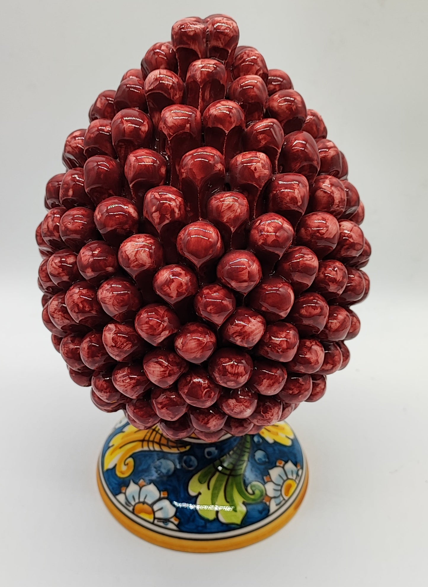 PRICE INCLUDES ONE CERAMIC PINE CONE. PLEASE SELECT MULTICOLOR OR BURGUNDY RED.