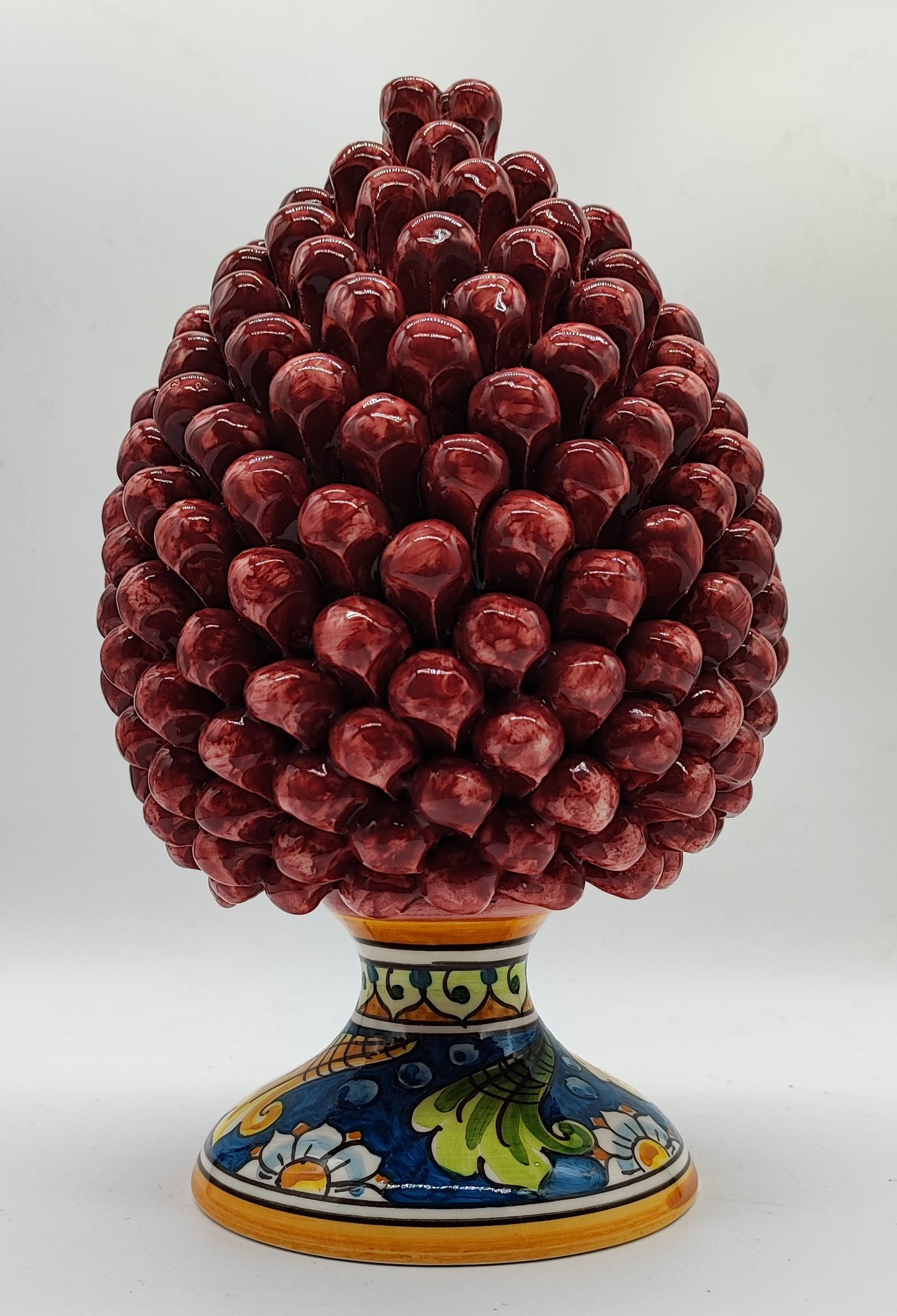 PRICE INCLUDES ONE CERAMIC PINE CONE. PLEASE SELECT MULTICOLOR OR BURGUNDY RED.