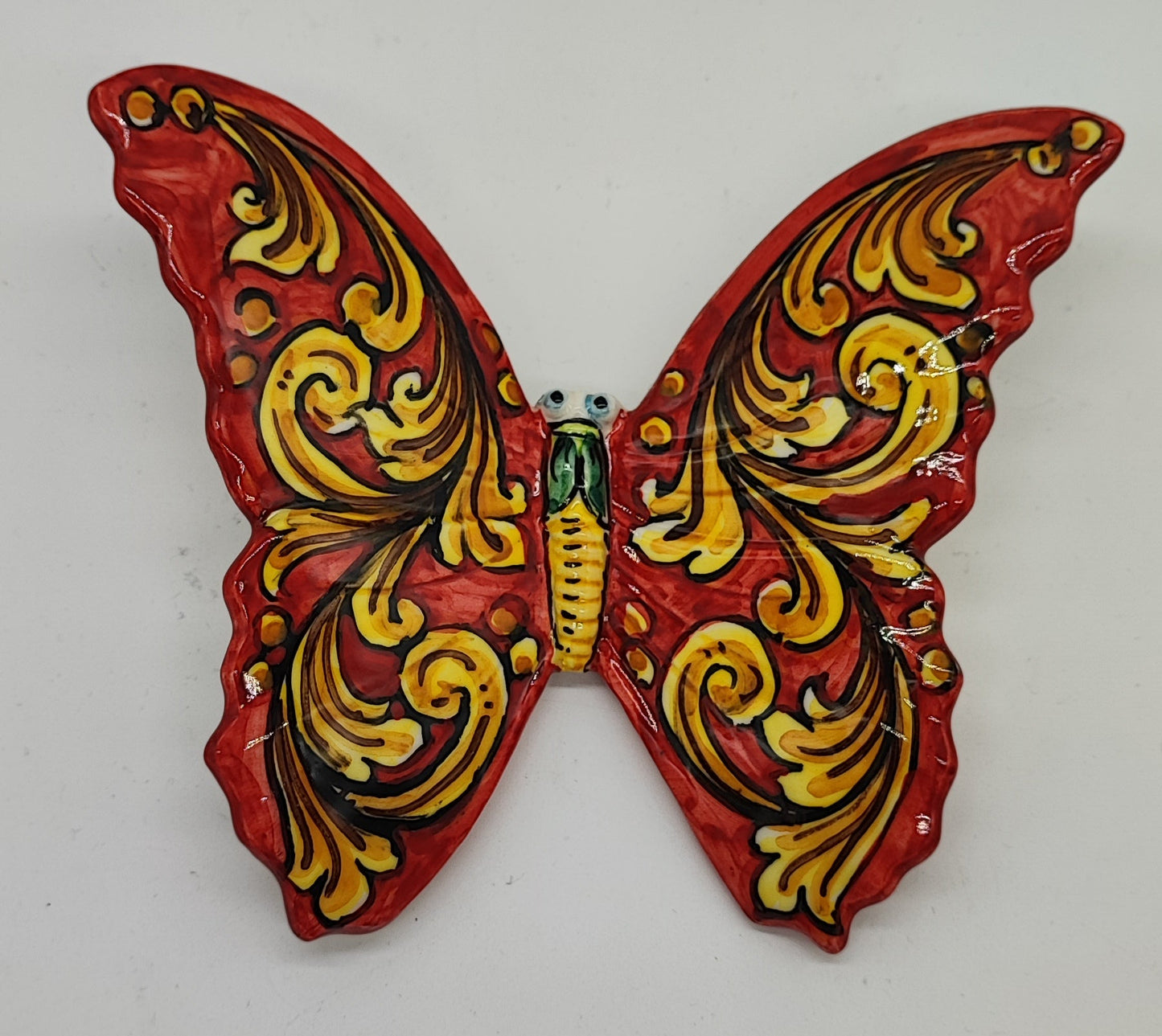 Glossy glazed finish on a handmade Sicilian ceramic butterfly