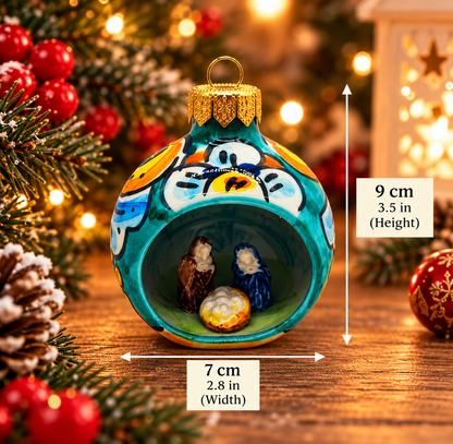 Turquoise Sicilian ceramic Christmas bauble with miniature Nativity scene