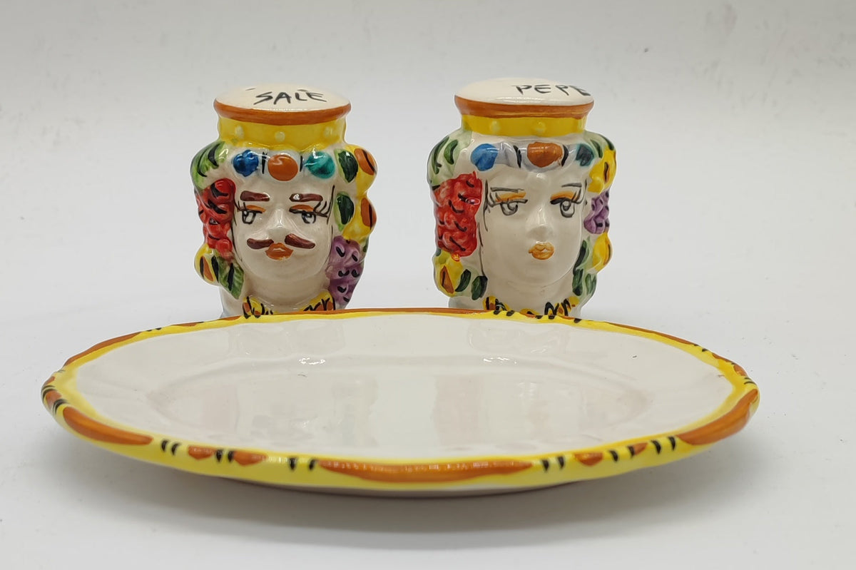 Matching ceramic tray displayed in front of the SALE and PEPE Moorish head containers