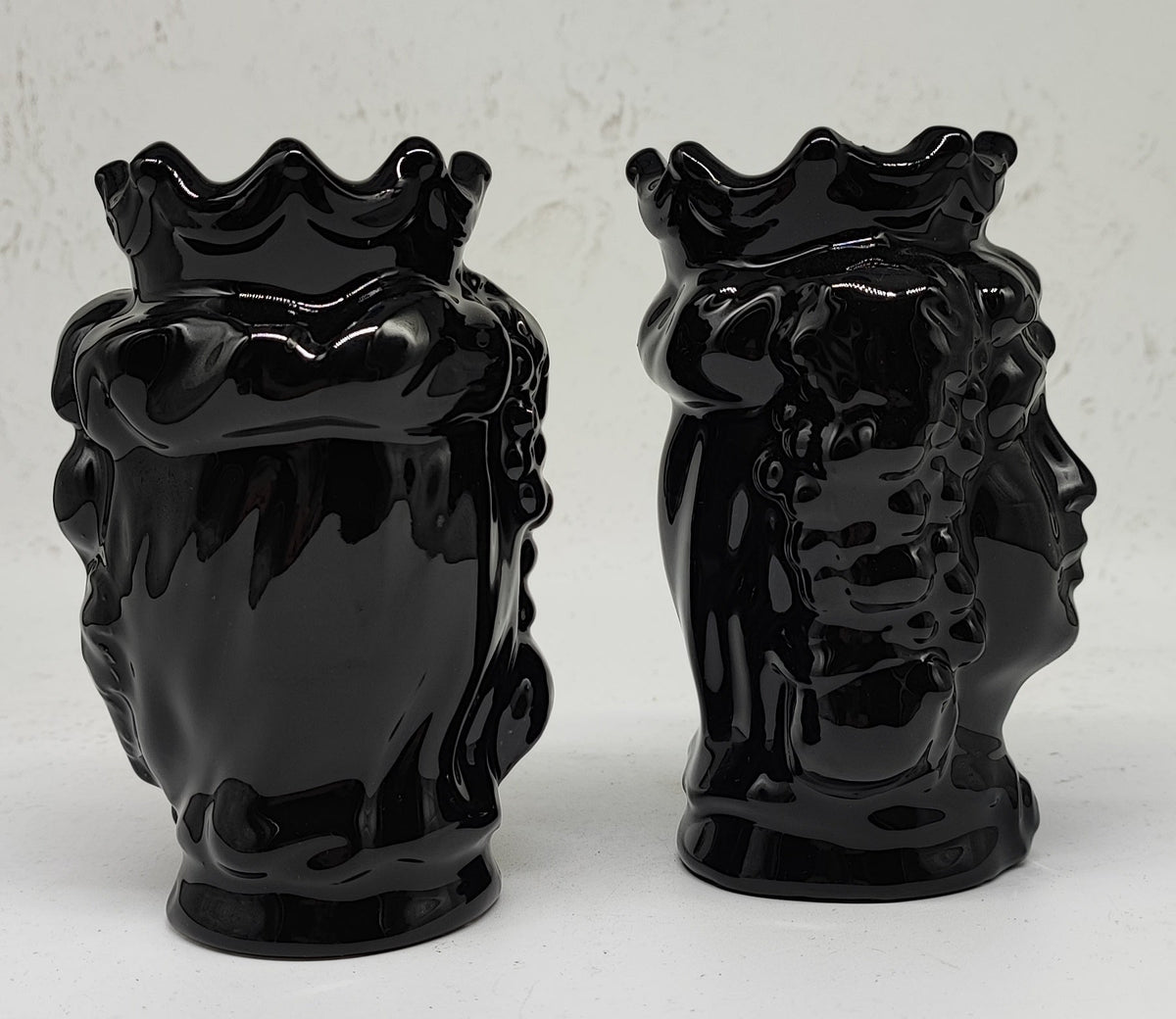 Back view of a handcrafted black Sicilian ceramic Moorish head vase