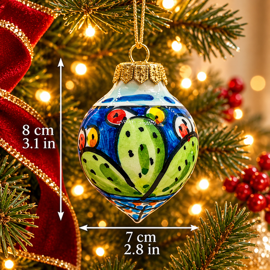 Blue Sicilian ceramic Christmas ornament with green prickly pear cactus, showing dimensions of 8 cm by 7 cm.