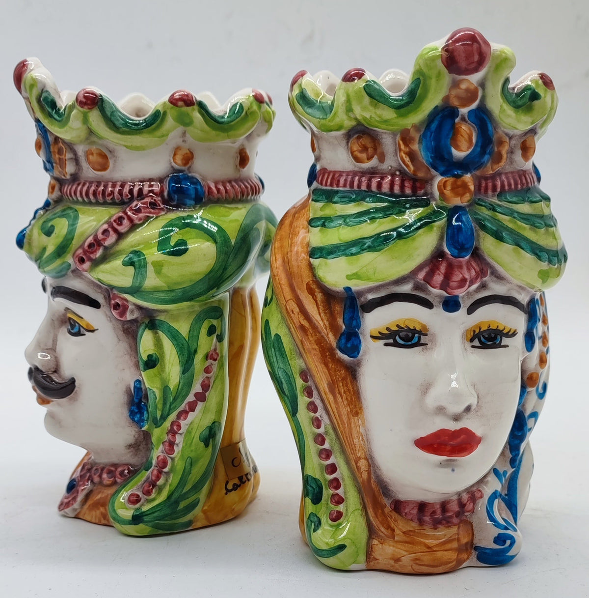 Sicilian Moorish Head ceramic king and queen vases showing colorful hand-painted details and artisan decoration from the back