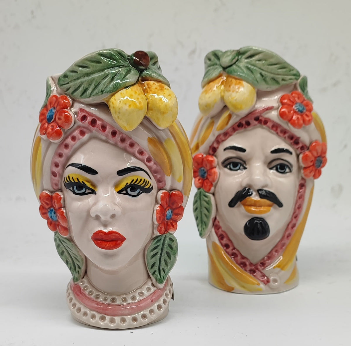 Sicilian Moorish Head ceramic couple displayed as elegant Mediterranean home decor