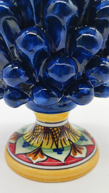 Cobalt blue Sicilian ceramic pine cone displayed as elegant country-style home decor