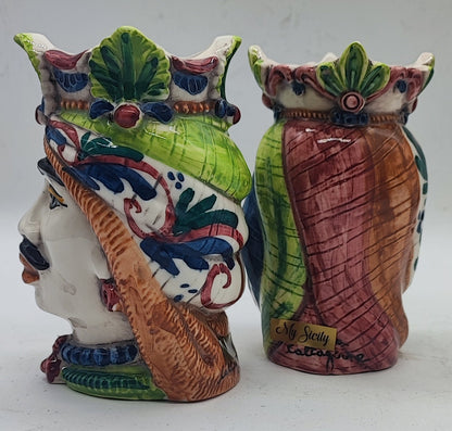 Close-up of colorful hand-painted details on traditional Sicilian Teste di Moro ceramics.