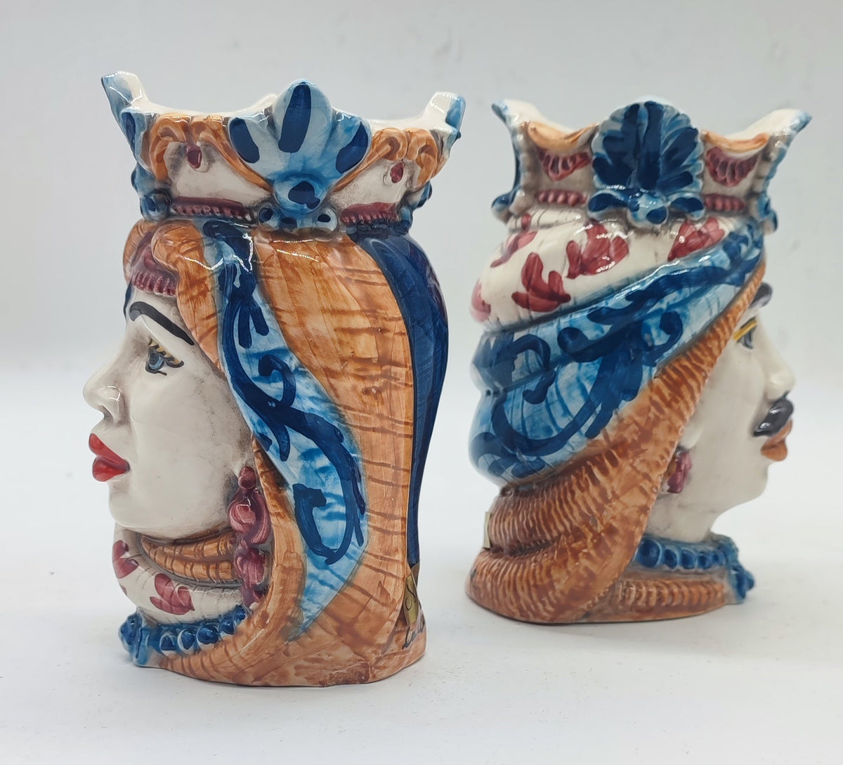 Close-up of hand-painted details on traditional Sicilian ceramic Teste di Moro Moorish Heads.