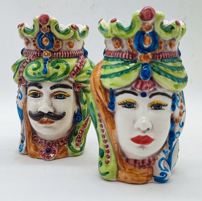 Authentic hand-painted Sicilian Moorish Head king and queen ceramic vases with colorful decorative crowns, front view.