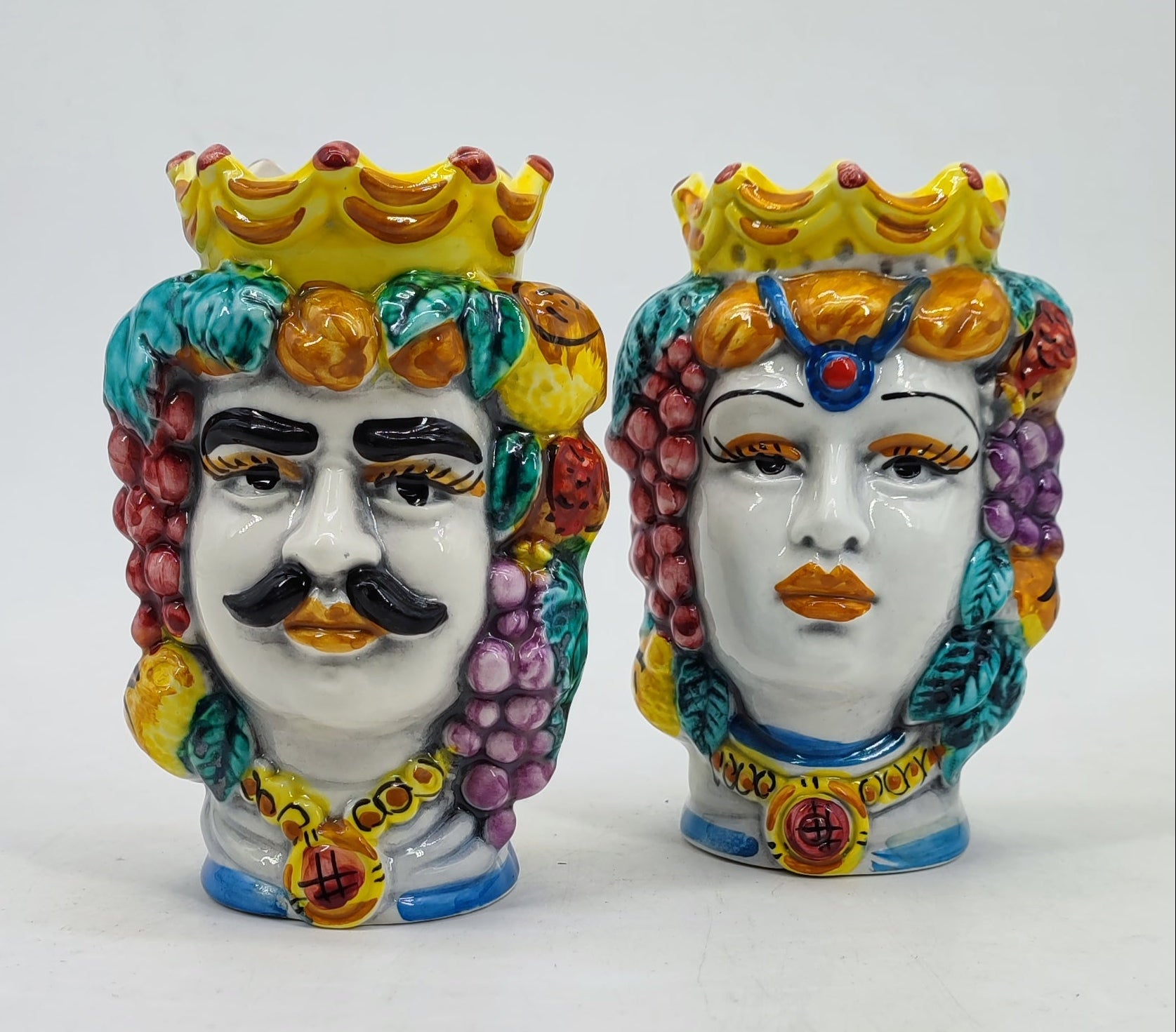 Close-up of colorful fruit and hand-painted details on a small Sicilian Moor’s Head