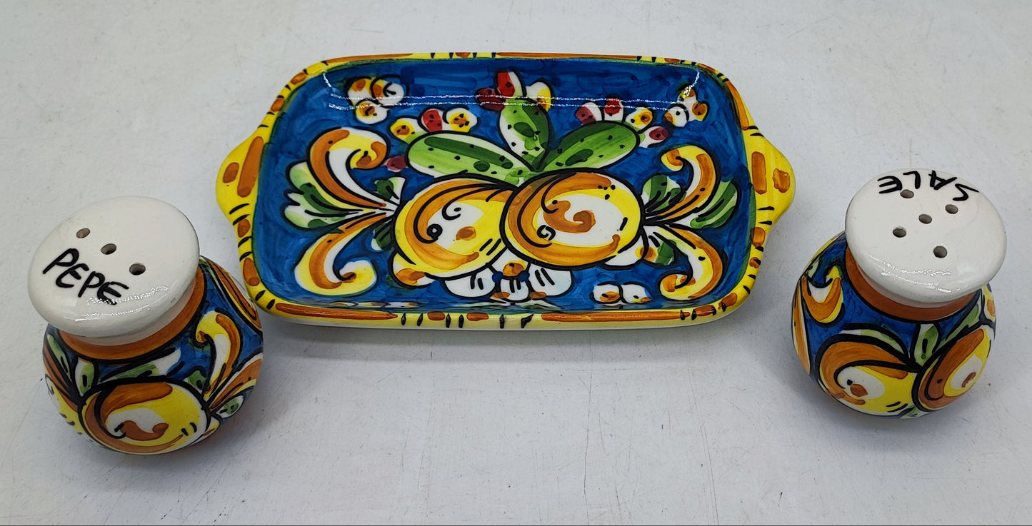 Hand-painted Sicilian ceramic salt shaker marked Sale with colorful Mediterranean decoration