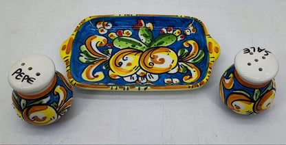 Hand-painted Sicilian ceramic salt shaker marked Sale with colorful Mediterranean decoration