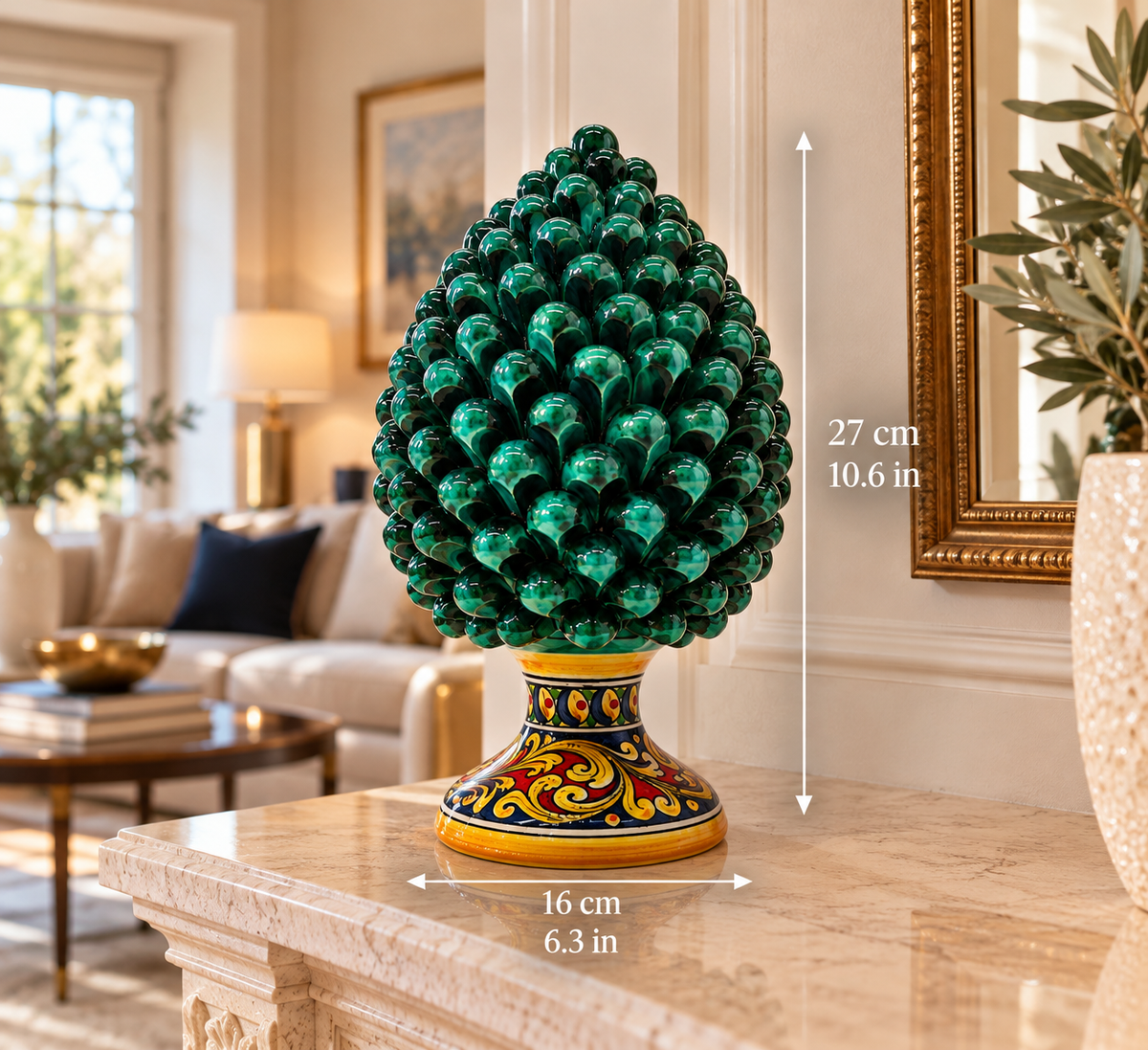 Handmade emerald green Sicilian Pigna with traditional hand-painted floral motifs on its colorful ceramic pedestal.