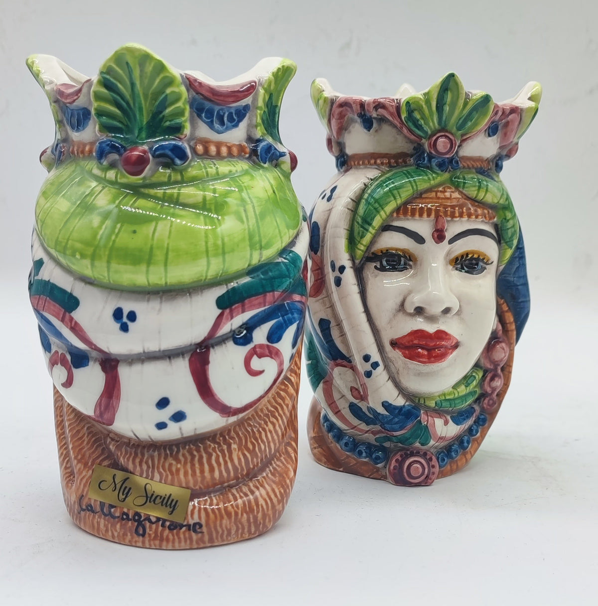 Small Sicilian Moorish Heads displayed as colorful Mediterranean Italian home decor.