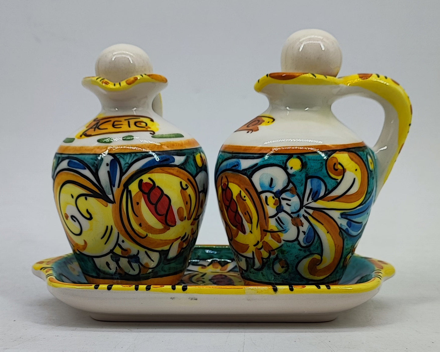 Hand-painted Sicilian ceramic vinegar bottle marked Aceto with a decorative stopper