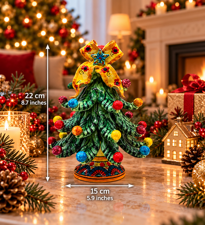 Hand-painted Sicilian Christmas tree with floral yellow bow, measuring 22 cm high and 15 cm wide.