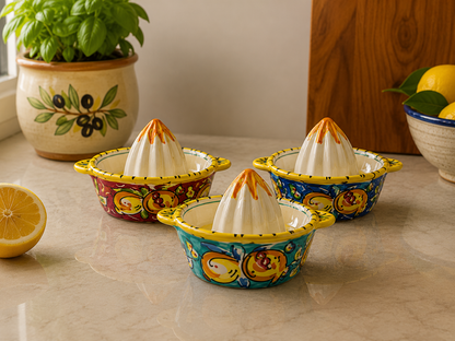 Three hand-painted Sicilian ceramic lemon squeezers in turquoise, blue and burgundy, each sold separately