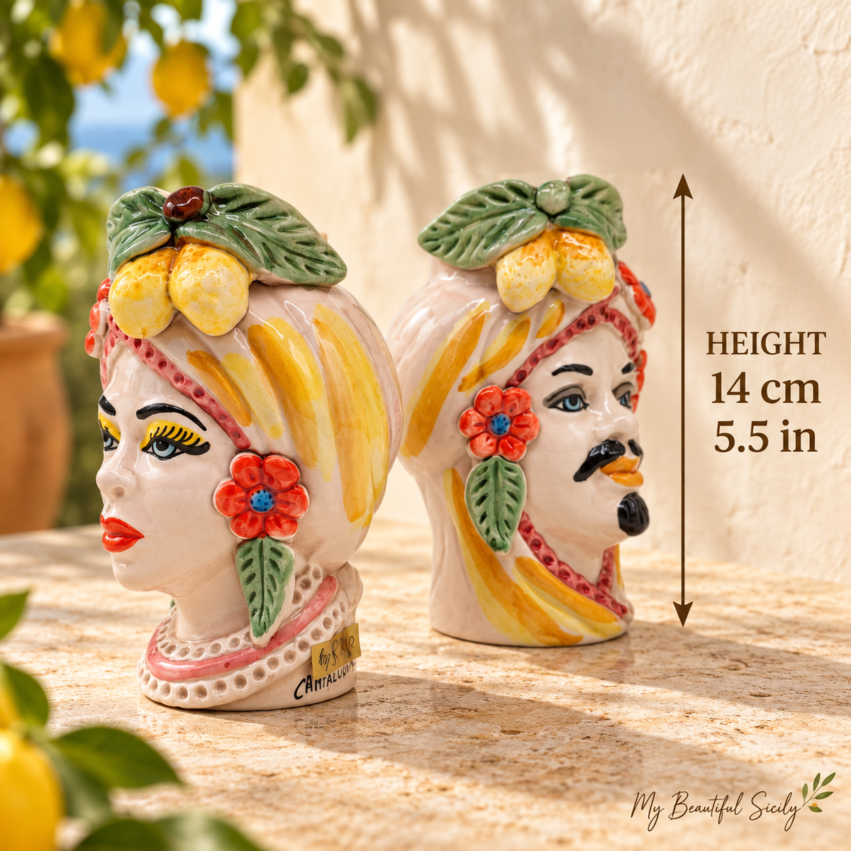 Traditional Sicilian ceramic Moorish Head couple with colorful lemon and floral decorations, made in Italy