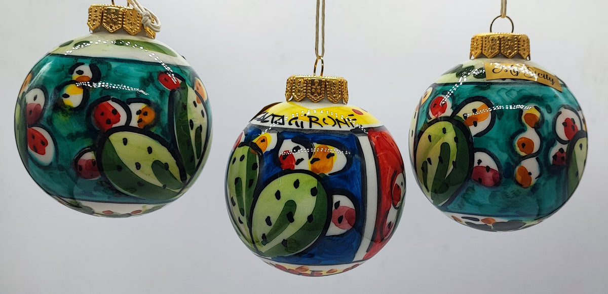 Three authentic Caltagirone ceramic Christmas ornaments with colorful cactus patterns