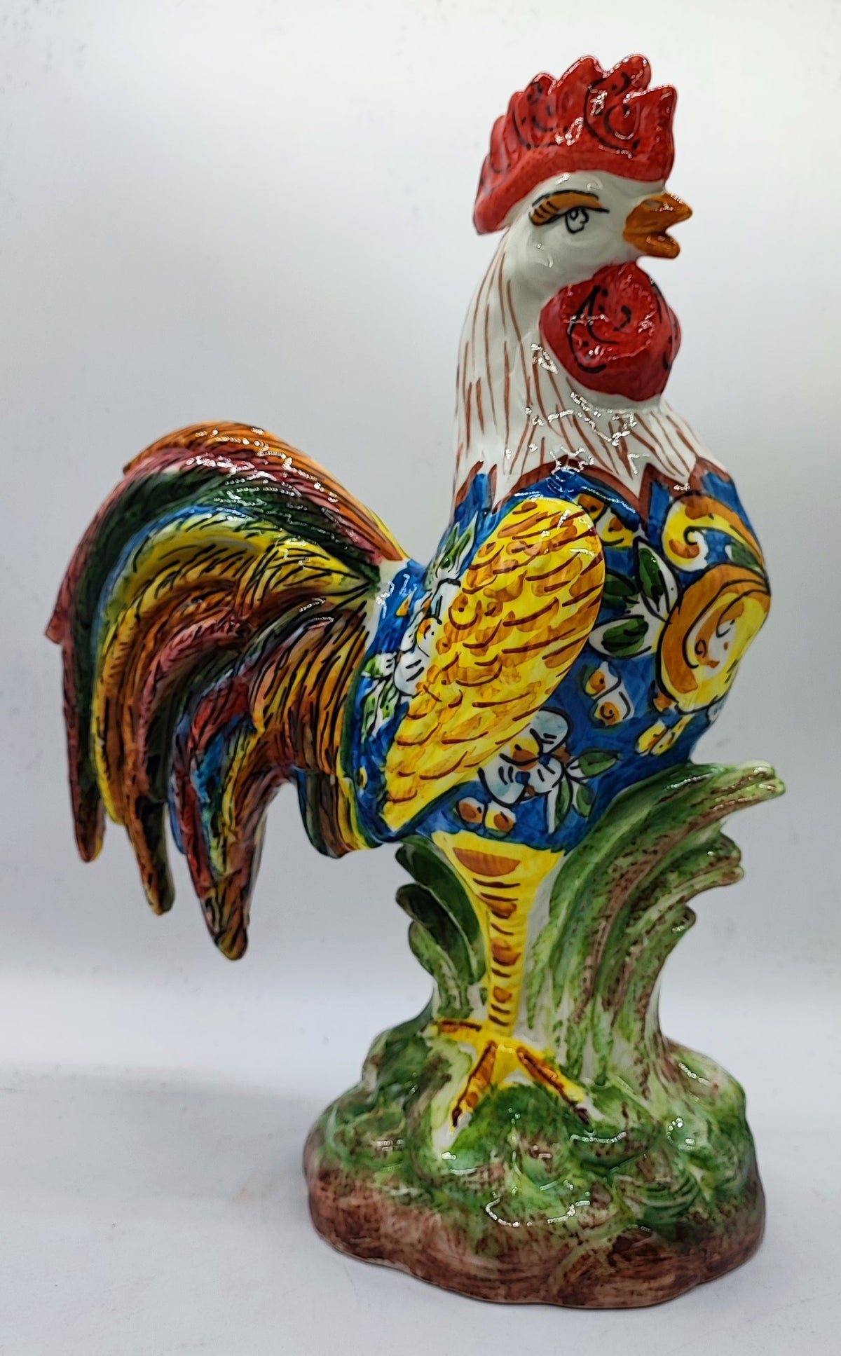 	Hand painted Italian ceramic rooster with colorful decorative tail