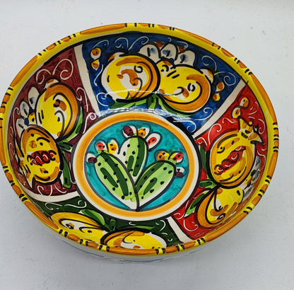 Colorful Caltagirone ceramic serving bowl featuring traditional prickly pear decoration