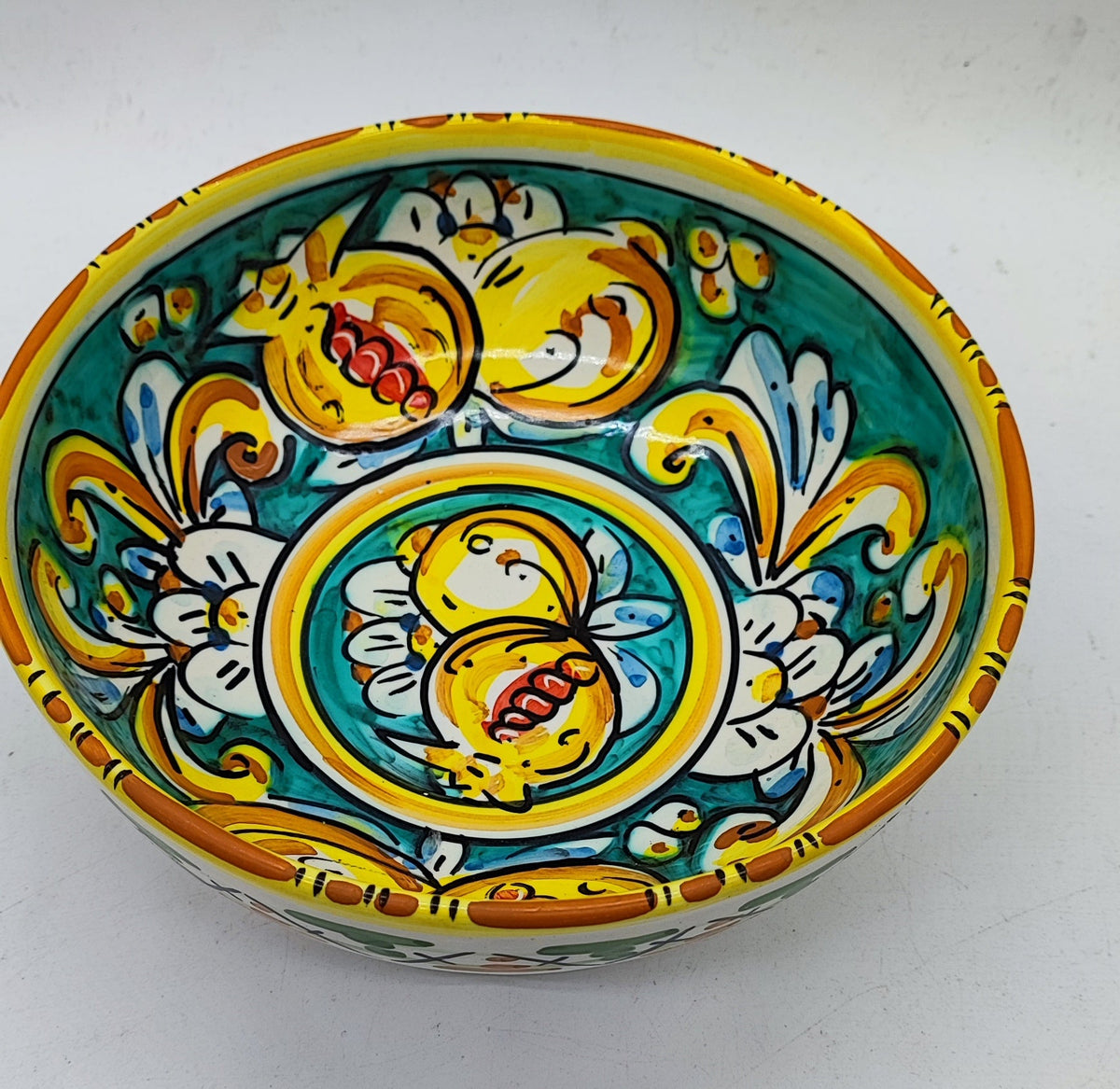 Hand painted Italian ceramic bowl with yellow lemons and white floral decoration