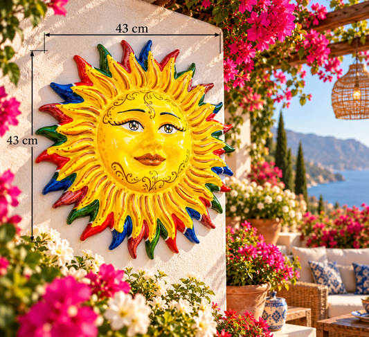Sicilian ceramic sun wall decor measuring 43 cm high and 43 cm wide, featuring a yellow face and colorful red, blue and green rays, handmade in Italy.