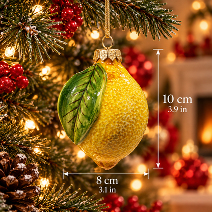 Hand-painted Sicilian lemon ceramic Christmas ornament hanging on a festive tree, measuring 10 cm high and 8 cm wide.