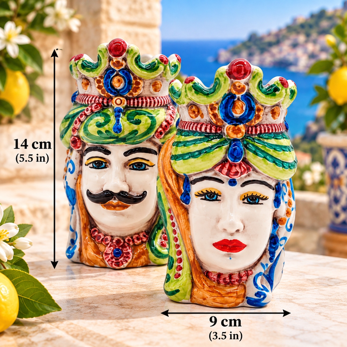 Sicilian ceramic Moorish Head king and queen pair measuring 14 cm high and 9 cm wide, with dimensions in inches.