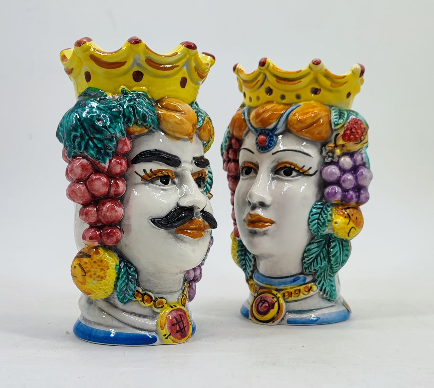 Male and female Sicilian Moor’s Head ceramic vases displayed together and sold separately