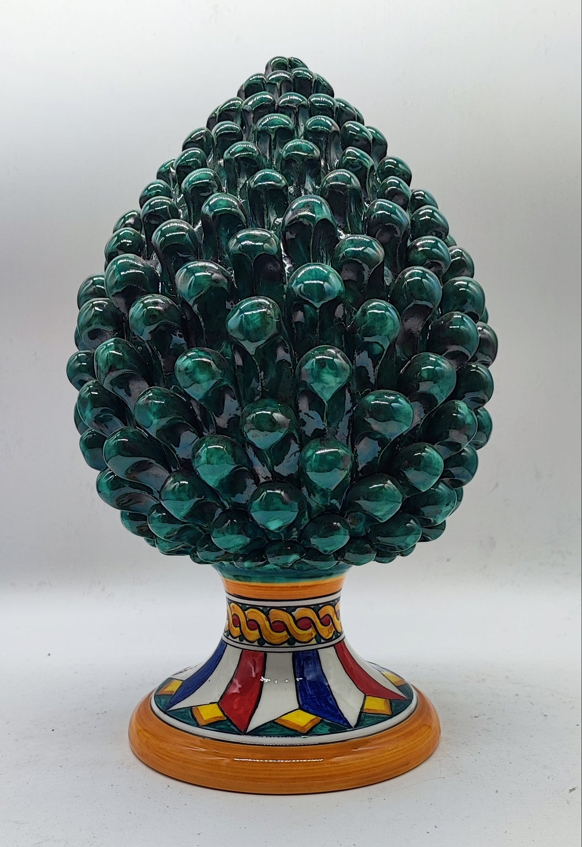 Emerald green Sicilian ceramic pine cone measuring 30 cm (11.8 inches) high and 19 cm (7.5 inches) wide.