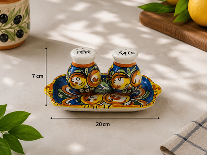 Sicilian ceramic salt and pepper shakers measuring 7 cm high with a 20 cm serving tray