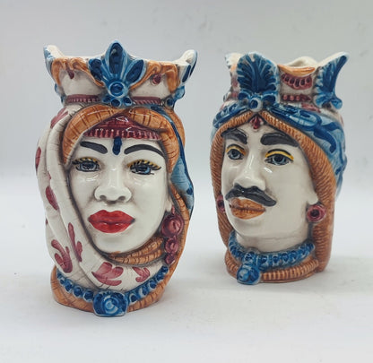 Sicilian Teste di Moro ceramic pair measuring 14 cm high and approximately 9 cm wide.