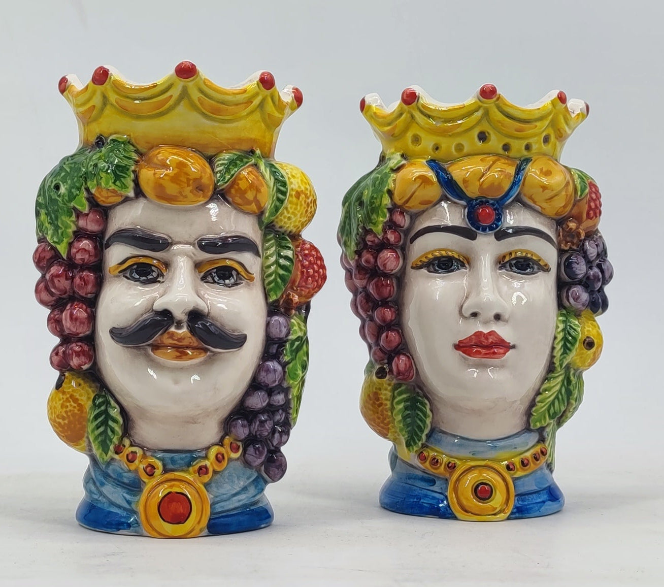 Male and female Teste di Moro ceramic heads measuring approximately 18 cm high each