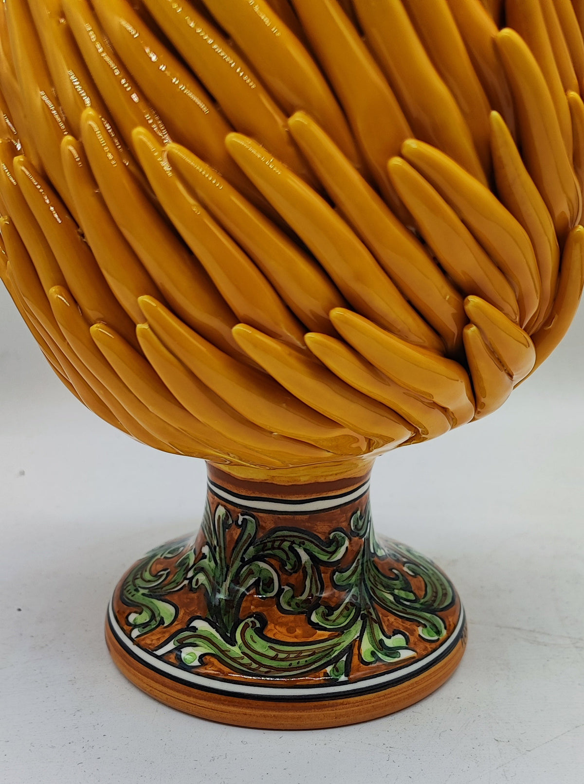 Yellow Sicilian Pigna displayed in an elegant Mediterranean home interior
