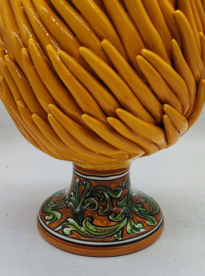 Yellow Sicilian Pigna displayed in an elegant Mediterranean home interior